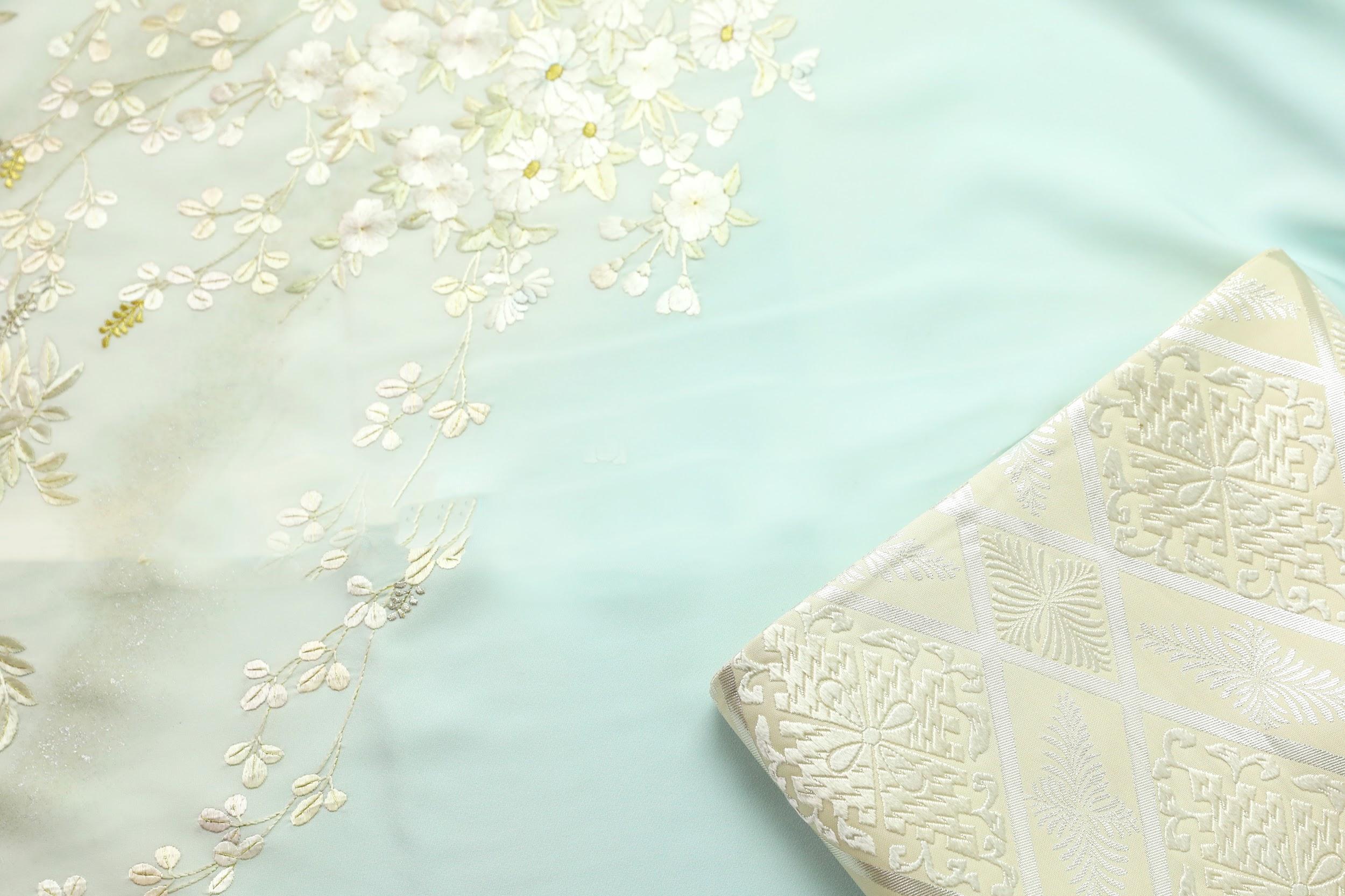手刺繍訪問着「清麗花の宴」西陣織手織り袋帯「御代菱取文」