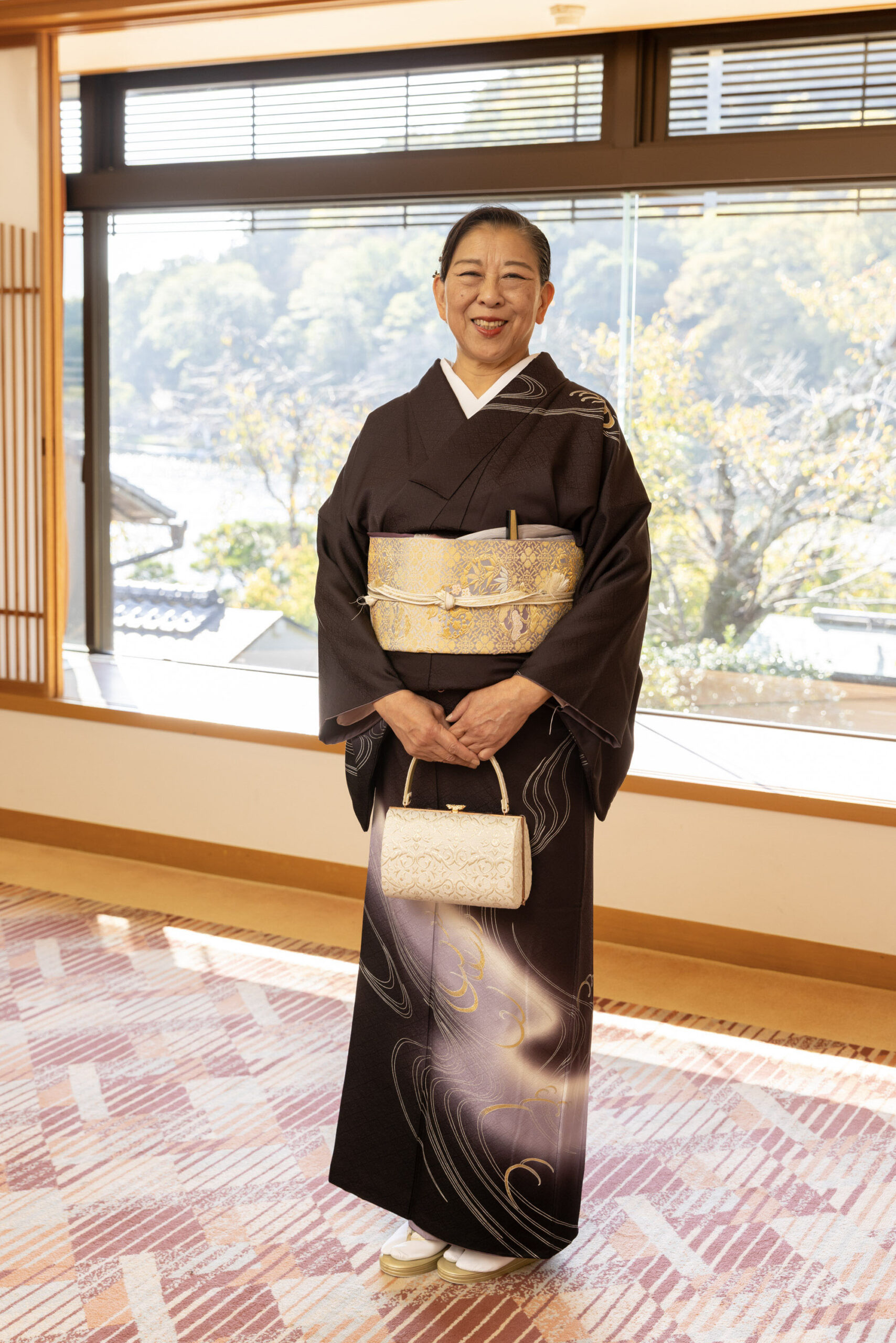 娘の晴れ姿を見守る母・直実さん