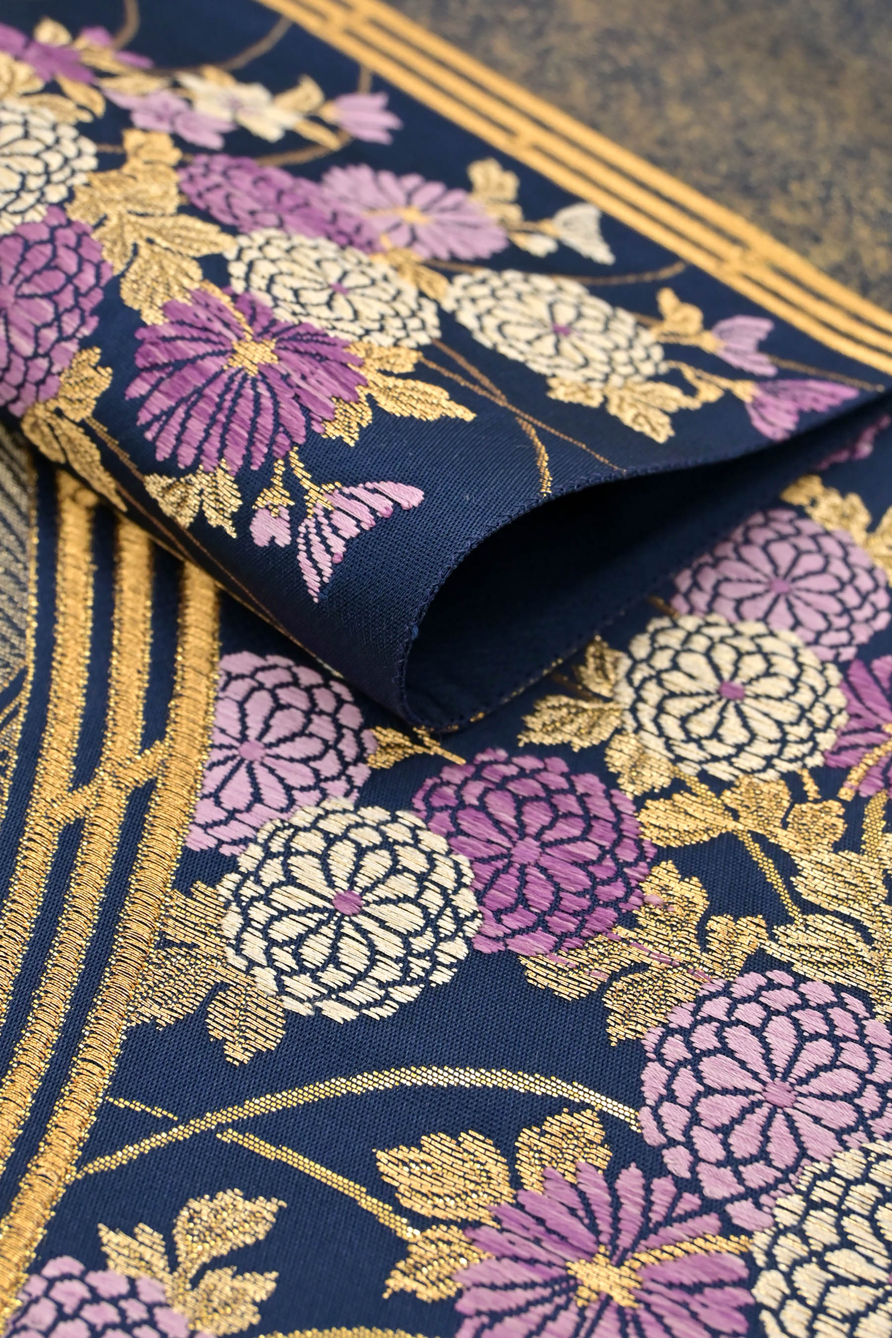 O-1599 袋帯 西陣じゅらく 帝王紫 四季の花々 雲 芝紋 金色